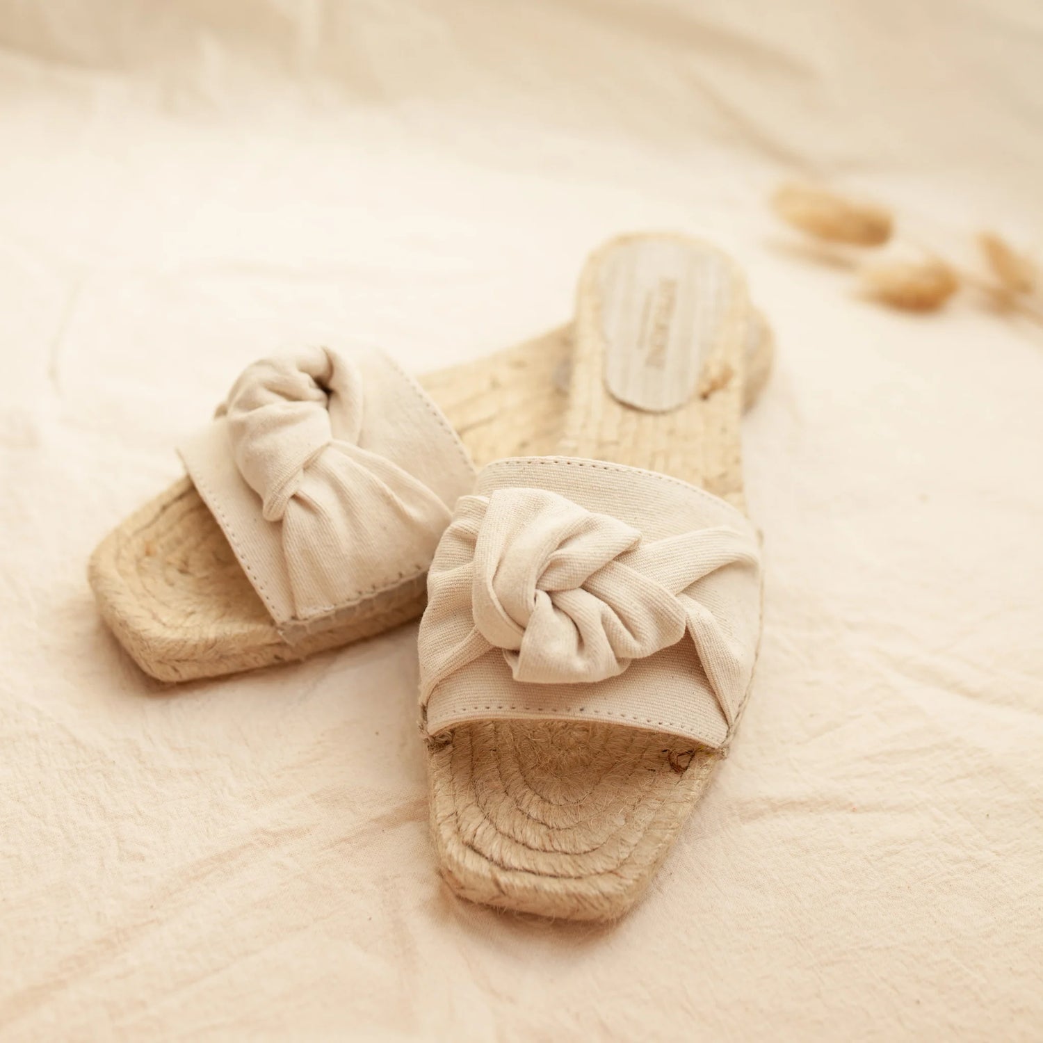 The Ivory Soft Vegan Knot Flats